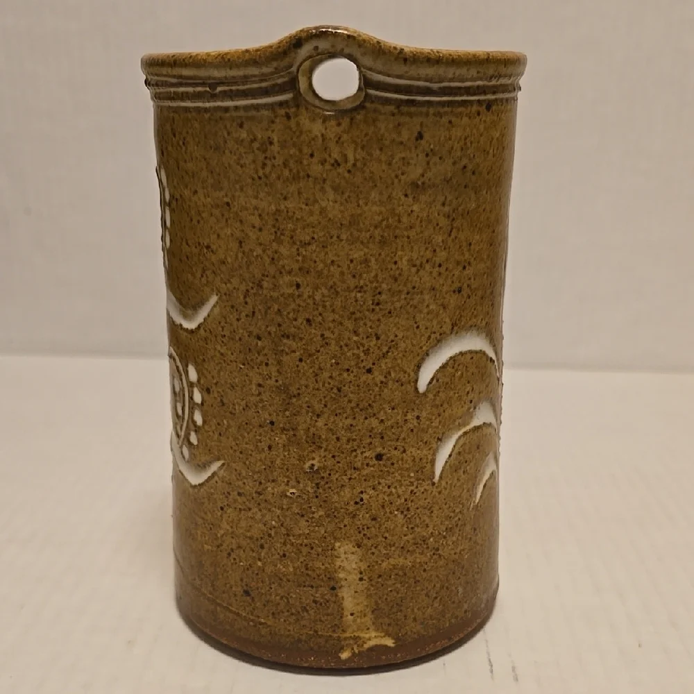 Brown Signed Pottery Vase with White Floral Design